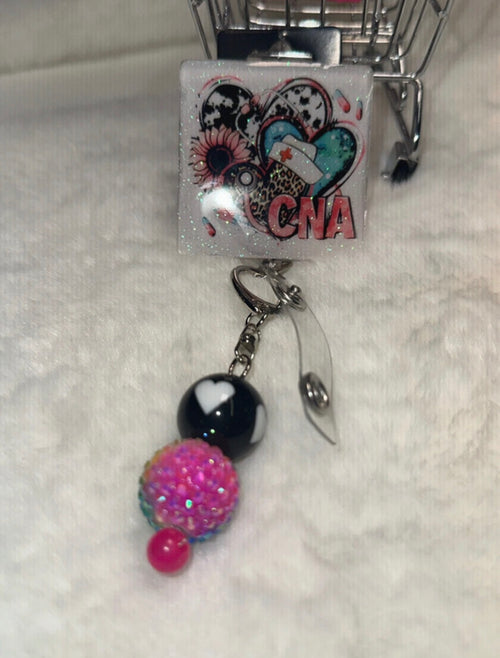 CNA Floral Heart Badge Reel