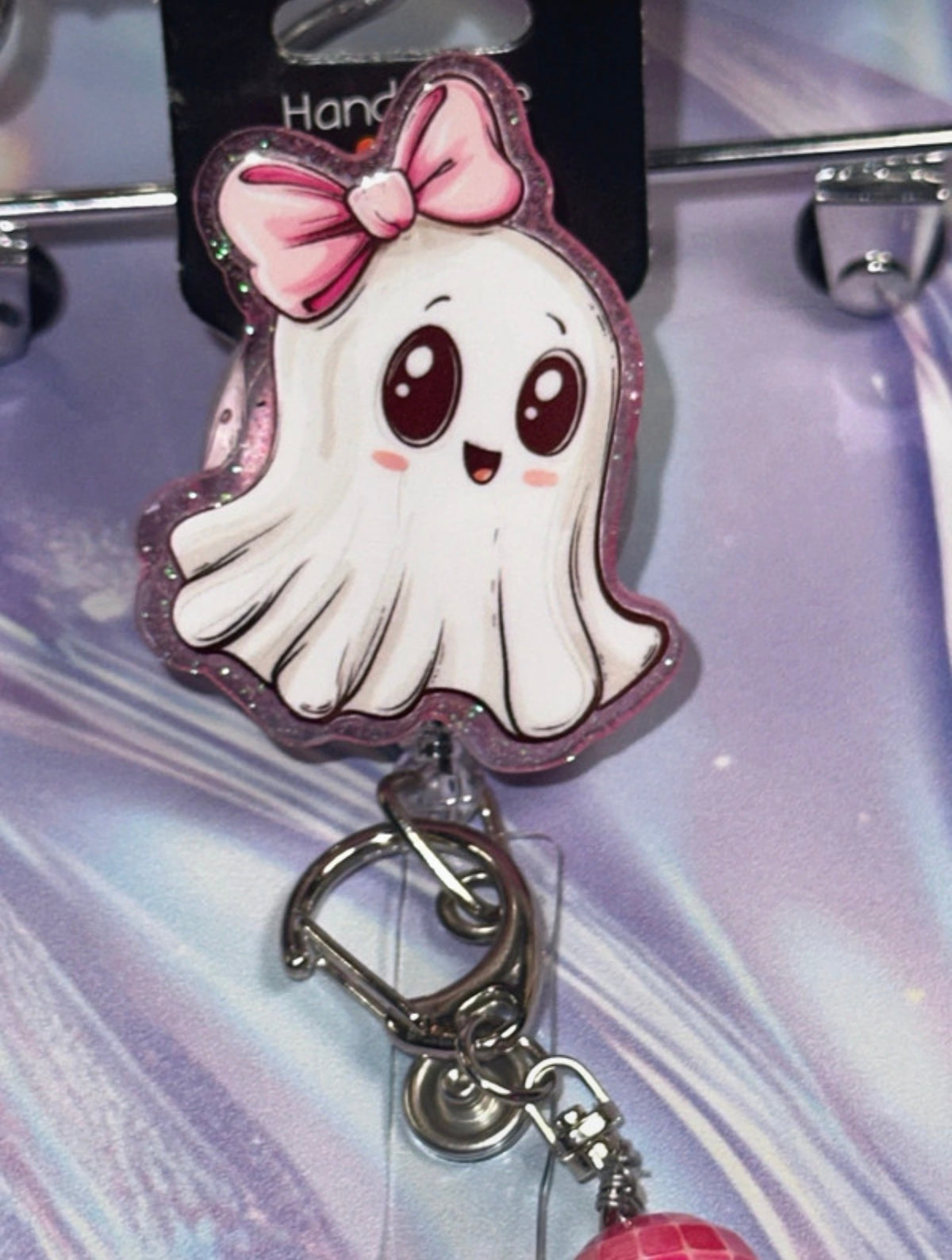 Pink bow ghost badge reel